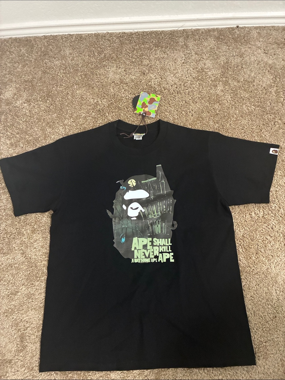 A Bathing Ape Black Graphic Kids Tee - 'Ape Shall Never Kill Ape'